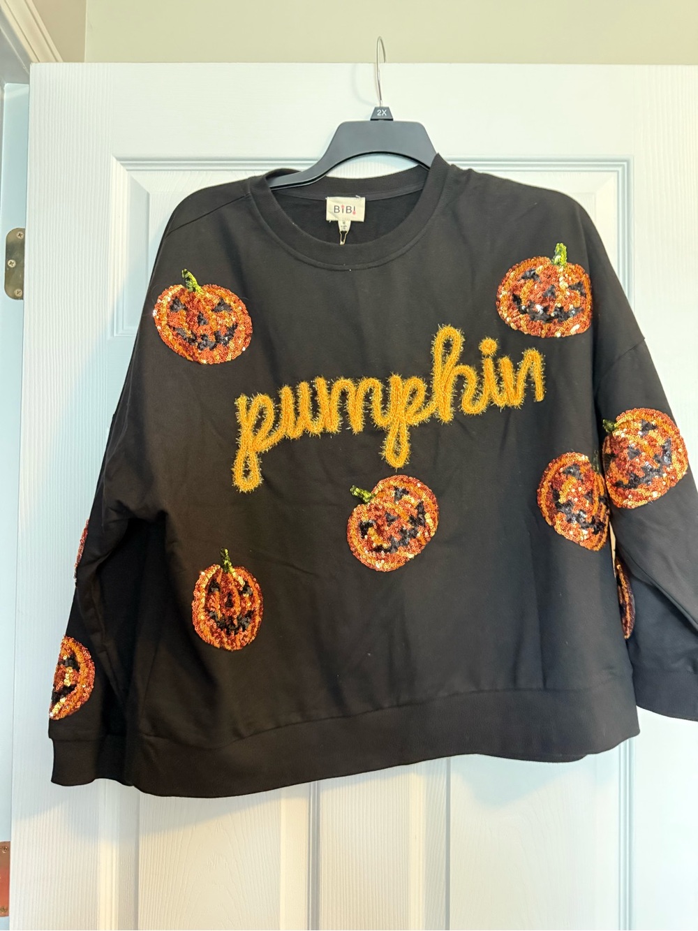 BiBi Black Sweater with Yellow 'pumpkin' Script and Orange Sequin Pumpkins
